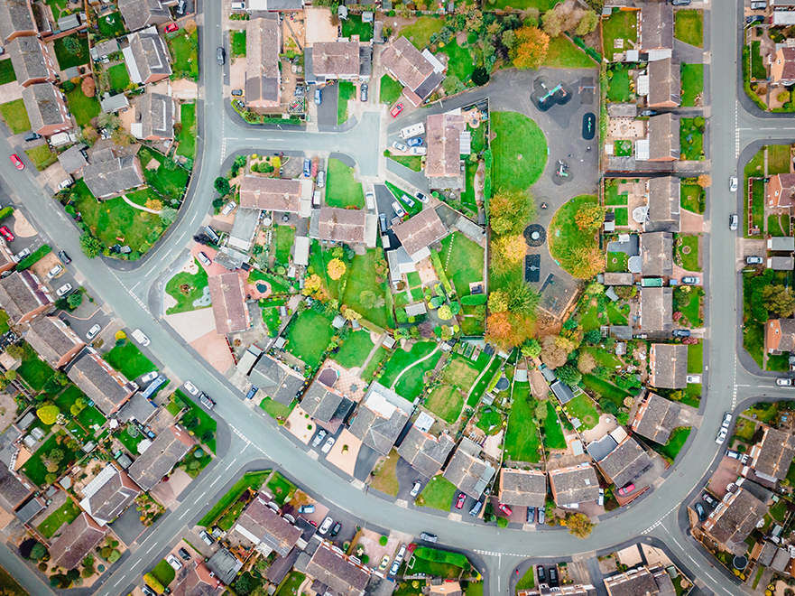 Looking straight down on streets and houses with community and social concepts